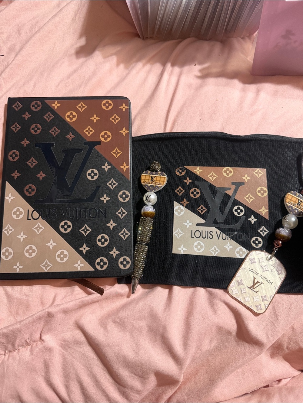 Black & brown journal with matching canvas pouch, keychain and pen.